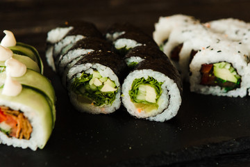 rolls with fresh fish, vegetables and cream cheese