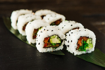rolls with fresh fish, vegetables and cream cheese