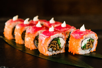 rolls with fresh fish, vegetables and cream cheese