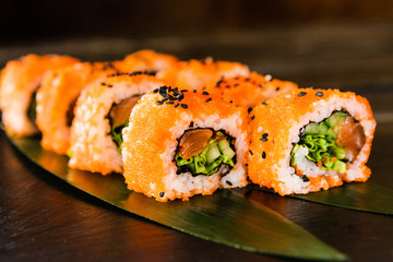 rolls with fresh fish, vegetables and cream cheese