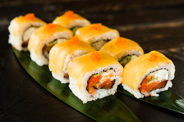 rolls with fresh fish, vegetables and cream cheese