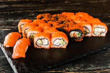 rolls with fresh fish, vegetables and cream cheese