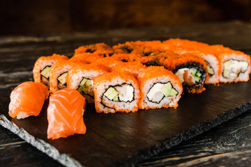 rolls with fresh fish, vegetables and cream cheese