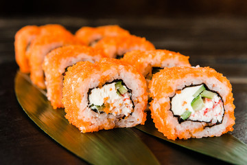 rolls with fresh fish, vegetables and cream cheese