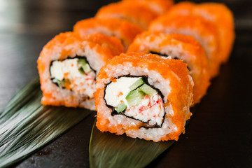 rolls with fresh fish, vegetables and cream cheese