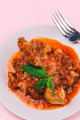 Chicken with tomato sauce