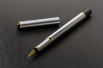 Fountain pen with clipping path on black background