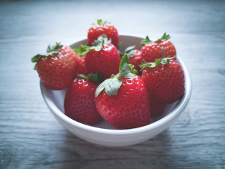 Strawberries in white bowl