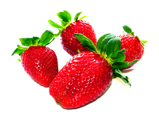 Red strawberries with green leaves isolated on white background.
