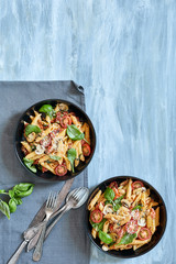 Pasta dish with tomato and mushoom sauce