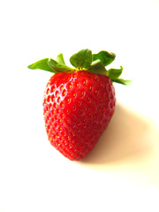 Red strawberries with green leaves isolated on white background.