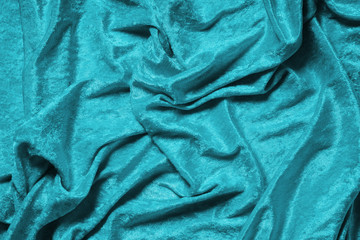 cyan blue or turquoise panne velvet drape background texture
