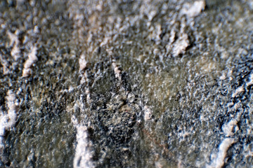 Iron ore.Metallic iron. Close up. Blurred boundaries. Minerals of the Earth. Extraction of natural iron ore. Benefits for the economy. Rocks and minerals.