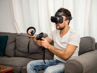 Man playing VR at home