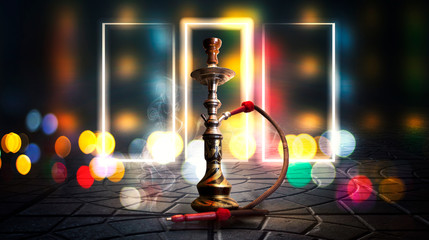 Hookah smoking on a dark abstract background. Hookah on a concrete background, neon lights, blurred night lights, bokeh