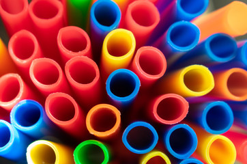 Top view of colorful plastic tubes 