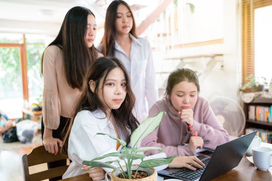 Business Women Co Working Group Make Idea Discussion With Laptop