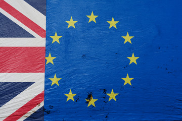 Image of the flag of European Union and England on the dirty, bright canvas tent wall