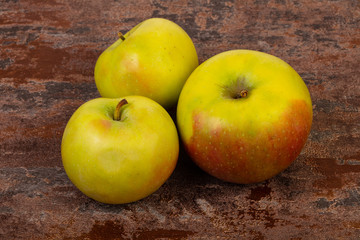 Ripe apples over background