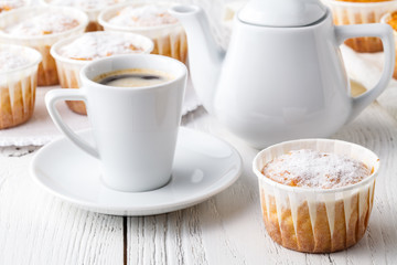 Homemade pumpkin muffins on the wooden table