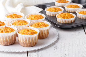 Making of homemade pumpkin muffins, in a baking pan