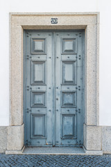 The old wooden door. Ancient antique wooden in an old wall.