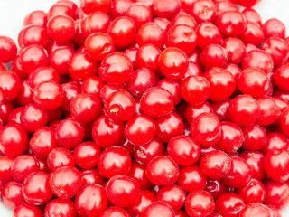 Large heap of nanking cherries. Ripe and tasty sweet fruits