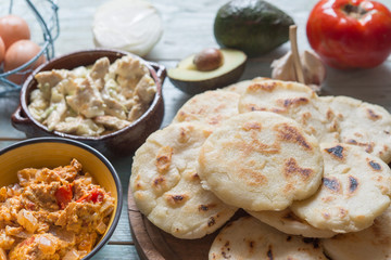 Arepas with reina pepiada and huevo revueltos