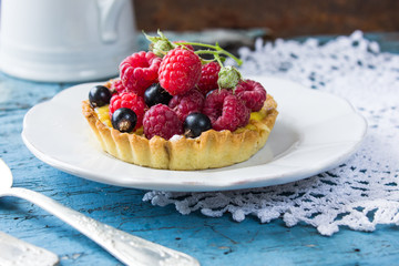  tartalets with lemon curd  nuts and berry