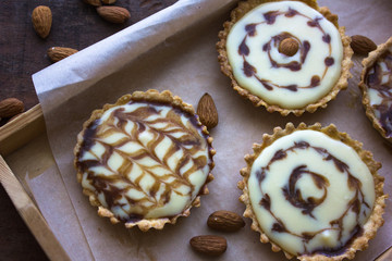  tartalets with lemon curd  nuts and berry