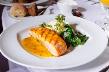 Grilled Salmon Steak with Spinach,Mash potato, souse