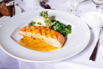 Grilled Salmon Steak with Spinach,Mash potato, souse