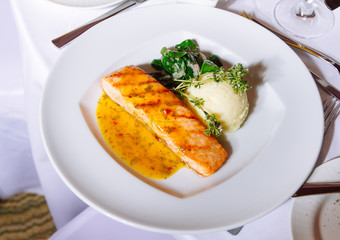 Grilled Salmon Steak with Spinach,Mash potato, souse