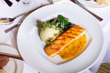 Grilled Salmon Steak with Spinach,Mash potato, souse