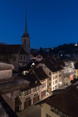 Fototapeta na wymiar Bern, Capital of Switzerland at night during the blue hour, vertical