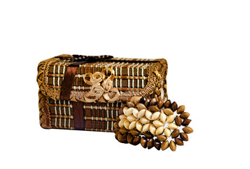 Vintage casket and wooden hair clip on white background. Isolated objects. Women's jewelry.