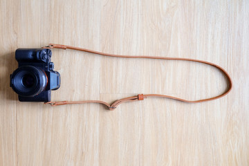 Naklejka premium Brown leather camera strap