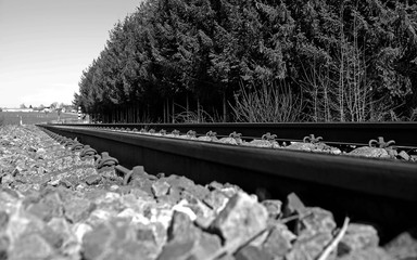 Reichstaedt / Germany: View over a single-track railway line in the rural landscape in Eastern...