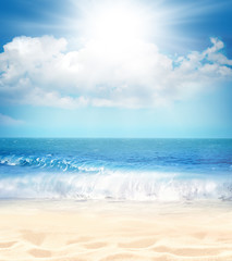 Fototapeta na wymiar Summer beach background. Sand, sea and sky.