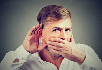 Portrait of an eavesdropping a gossip man
