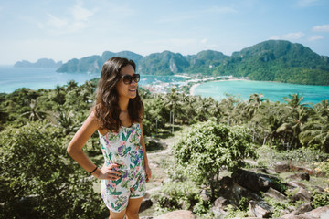 Koh Phi Phi Don, Viewpoint - Girl enjoying beautiful view of paradise bay from the top of the...