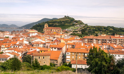 Fototapeta premium Rural town near the sea in the north of Spain in a cloudy day