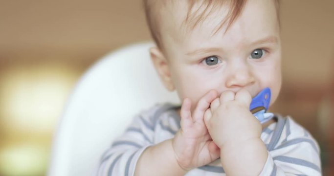 Baby boy with a pacifier