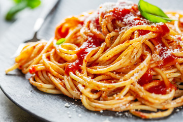 Tasty italian pizza with tomato sauce and parmesan
