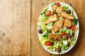 Chicken salad with vegetables and olives