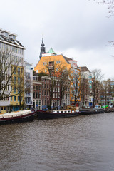 Fototapeta premium Old buildings in Amsterdam, the Netherlands
