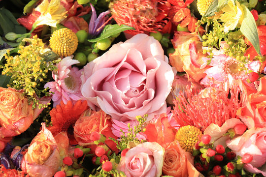 Bridal flowers in orange, yellow and pink