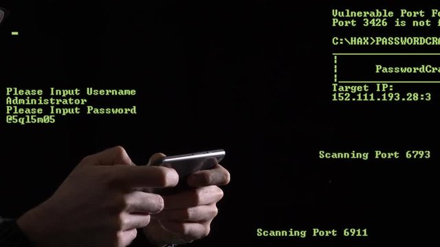 Fingers typing on a smartphone on a dark background. Green coding appearing on the screen showing the hacking process.