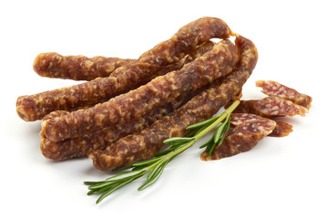 Dry wild meat sticks. Jerky sausages, close-up, isolated on white background