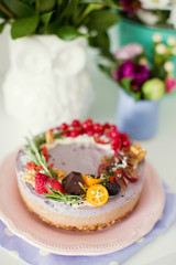 Obraz na płótnie Canvas raw vegan cake with fruits and seeds